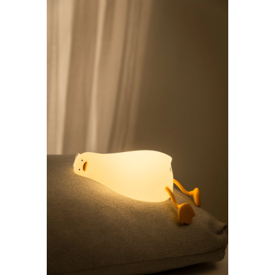 Силиконовый сенсорный ночник-игрушка "Лежачая утка" K1096